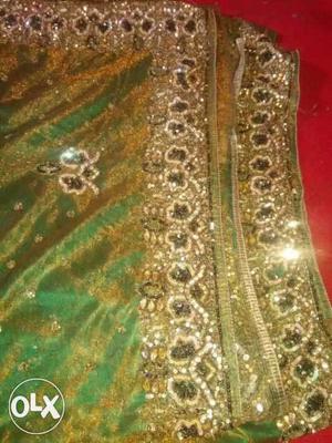 Green And Gold Beaded Textile