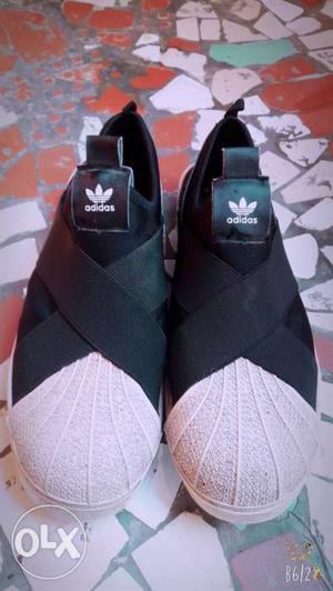Pair Of Black-and-white Adidas Shoes SUPERSTAR