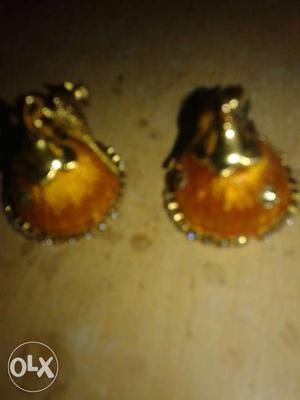 Pair Of Orange Jhumkas Earrings