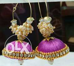 Pair Of Pink And Gold Jhumka Earrings