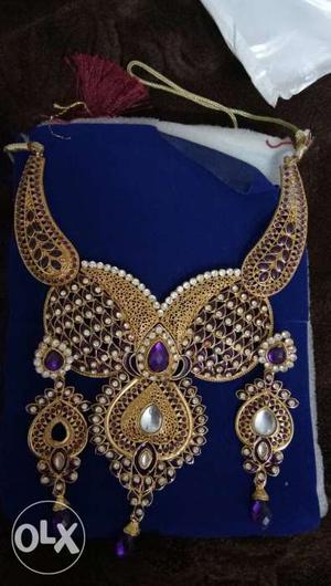 Purple n gold necklace with earnings for sale