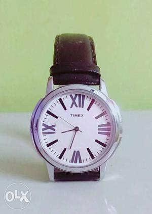 Timex wrist watch with leather belt (looking