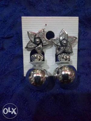 Two Silver-colored Ball Earrings