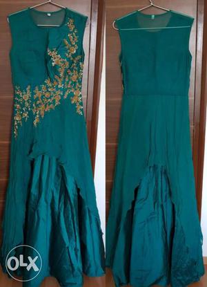 Women's teal color sleeveless gown