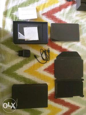 Nexus  in mint condition with charger, box and Cover.