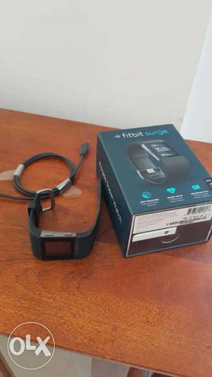 Fitbit surge. completely unused with box.