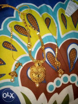 Gold-colored Encrusted Dangle Necklaces