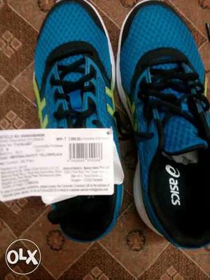 Pair Of Blue ASICS Running Shoes