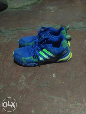 Pair Of Blue-and-green Adidas Running Shoes