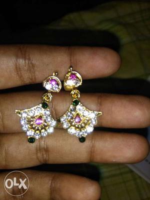 Pair Of Gold-colored Earrings With Clear Gemstones