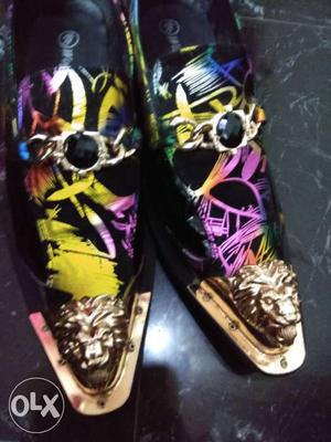 Pair Of Purple-and-black Leather Shoes