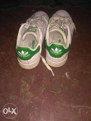 Pair Of White-and-green Adidas Low-top Sneaker