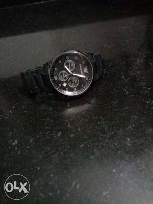 Round Silver Chronograph Watch With Black Link Bracelet