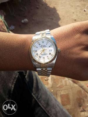 Round Silver Rolex Chronograph Watch With Link Bracelet