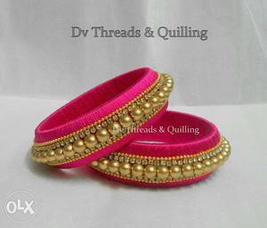 Two Red-and-gold-colored Silk Thread Bangles