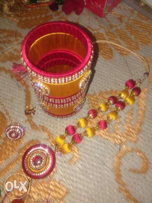 Two Yellow-and-red Silk Thread Bangles And 2-layered