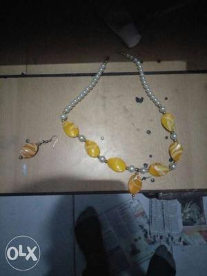 Yellow And White Beaded Necklace