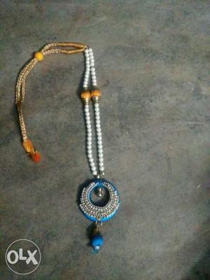 Yellow, White, And Blue Beaded Necklace