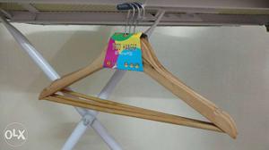 Brand new, wooden hangers, set of 3 AVAILABLE