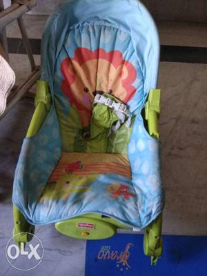 Green And Blue Fisher-Price Bouncer Seat