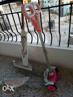 Pink And White Swing Scooter