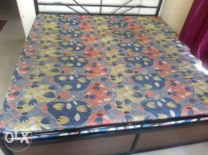 Quilted Gray, Blue, Yellow, And Red Floral Mattress