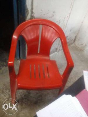 Red And Brown Wooden Chair