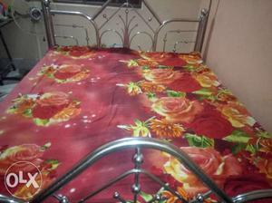 Red And Multi-colored Floral Bedspread