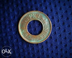 1 Copper-colored Indian Pice Coin