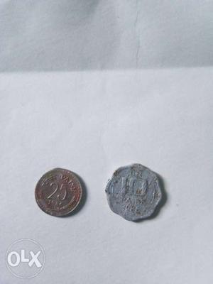 25 And 10 Silver-colored Coins