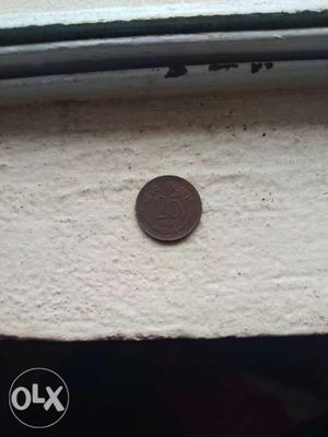 A 25 paise  old Indian coin