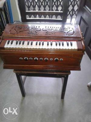 Brown Wooden Upright Piano With Chair