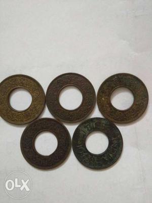Five Bronze-colored Pice Coins