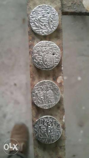 Four Round Silver-colored Nawanagar Coins