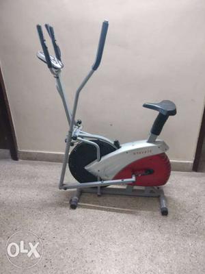 Gray, Red, And Black Stationary Bike