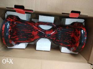 Red And Black Self-balancing Board With Box