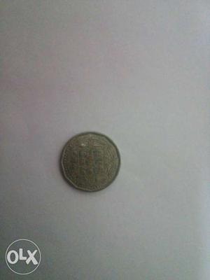 Round Silver-colored Coin