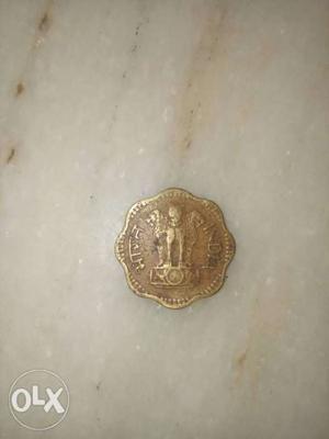 Scalloped-edge Gold-colored Indian Coin
