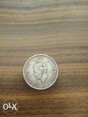 Silver-colored King Emperor Coin