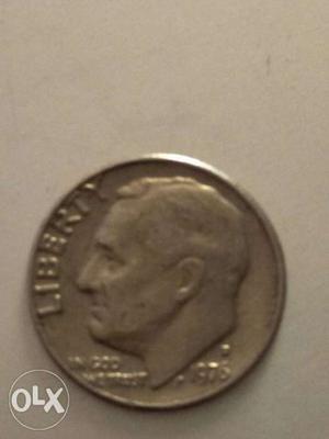 Silver-colored Lincoln Penny Coin