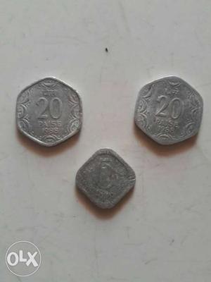 Three Silver-colored Two 20 And One 5 Indian Paise Coins