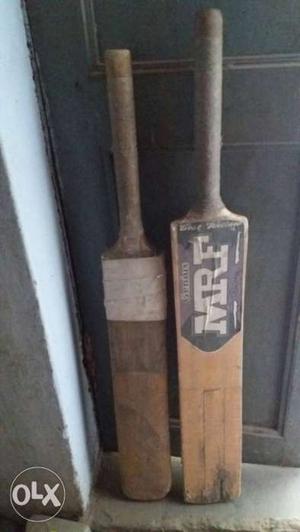 Two Brown Wooden Cricket Bat