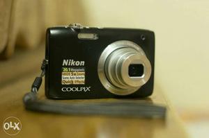 Black And White Nikon Coolpix Digital Camera