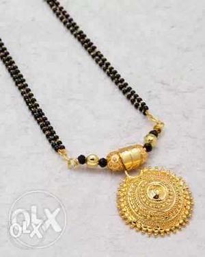 Black Bead Necklace With Round Gold Pendant