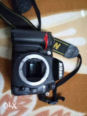 Black Nikon D DSLR Camera with Tamron mm f2.8 vc