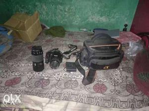 Black Sony DSLR Camera With Bag