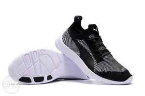 Black, White, And Gray Nike Zoom Sneaker