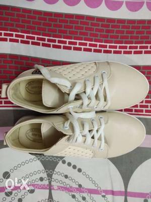 Cream colour,shoes for girls! For more details plz dm