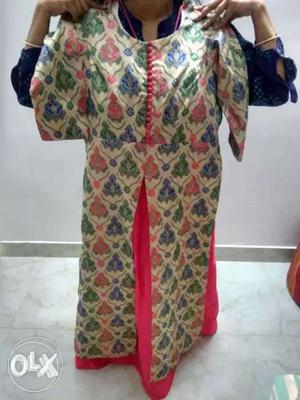 Designer one piece suit with cape Not used