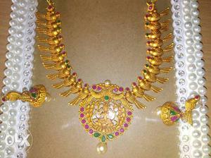 Gold-colored Fashion Necklace And Pair Of Earrings